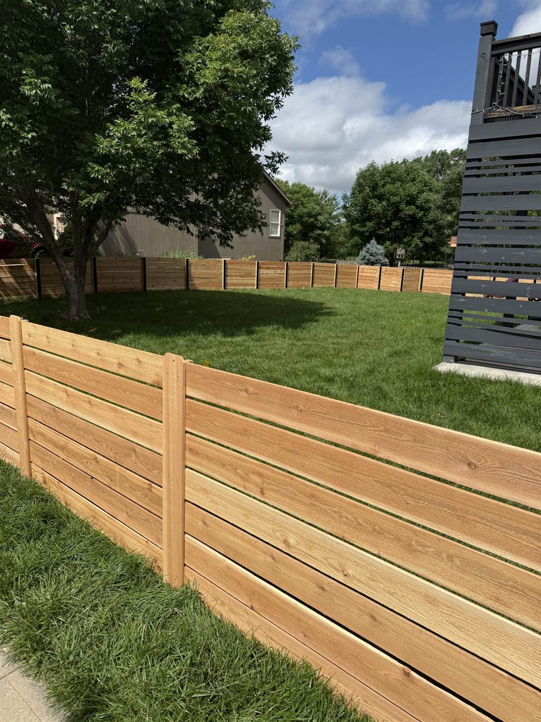 Cedar fence installation in North Dallas