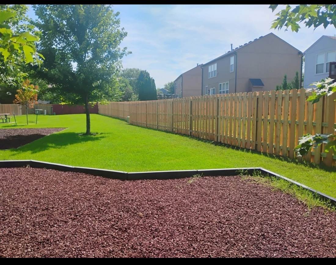 Cedar wood fence on hidden U-channel steel posts in North Dallas
