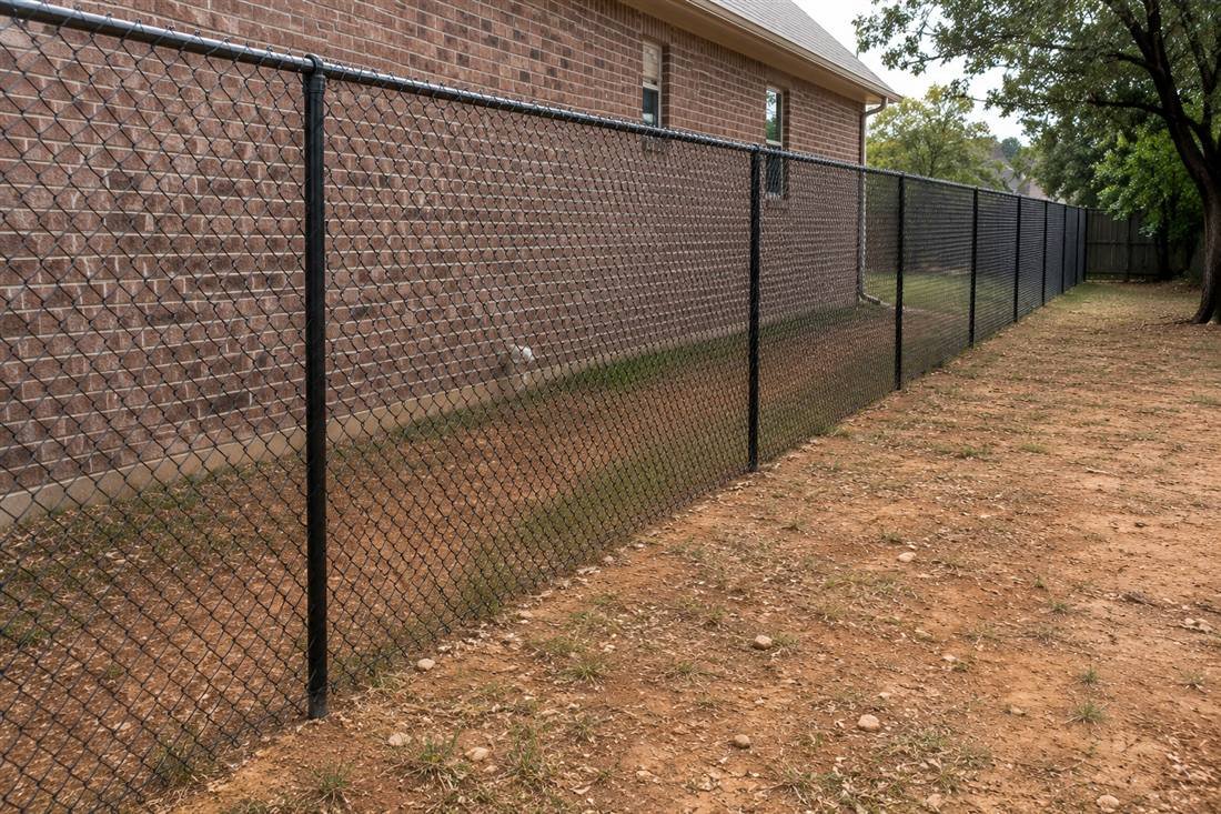Black chain link fence installed in Celina, TX